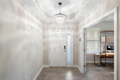 Welcome home to your stunning front porch LAKE VIEWS, on this on Orange County National Golf Center and Lodge in Florida - for sale on GolfHomes.com, golf home, golf lot