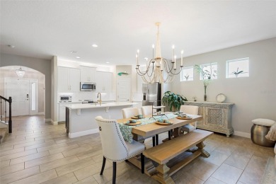Welcome home to your stunning front porch LAKE VIEWS, on this on Orange County National Golf Center and Lodge in Florida - for sale on GolfHomes.com, golf home, golf lot