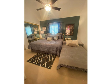 Welcome to this charming 2-bedroom, 2.5-bath condominium located on Errol Estates Country Club in Florida - for sale on GolfHomes.com, golf home, golf lot