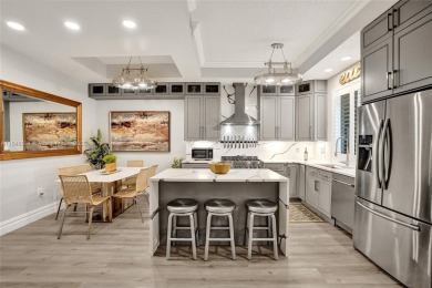 Live in the charming, historic Parrot Cove neighborhood of Lake on Lake Worth Municipal Golf Course in Florida - for sale on GolfHomes.com, golf home, golf lot
