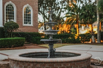 Midpoint Masterpiece - where mornings begin on the porch and on The Landings Club - Palmetto in Georgia - for sale on GolfHomes.com, golf home, golf lot