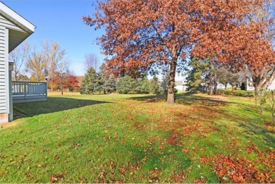 Nestled just a stones throw away from the beauty and serenity of on Oak Hill Golf Club in Minnesota - for sale on GolfHomes.com, golf home, golf lot