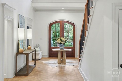 Midpoint Masterpiece - where mornings begin on the porch and on The Landings Club - Palmetto in Georgia - for sale on GolfHomes.com, golf home, golf lot