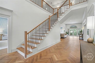 Midpoint Masterpiece - where mornings begin on the porch and on The Landings Club - Palmetto in Georgia - for sale on GolfHomes.com, golf home, golf lot