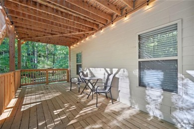 Welcome home to a beautifully updated retreat that truly checks on The Highlands Course at Lake Arrowhead in Georgia - for sale on GolfHomes.com, golf home, golf lot
