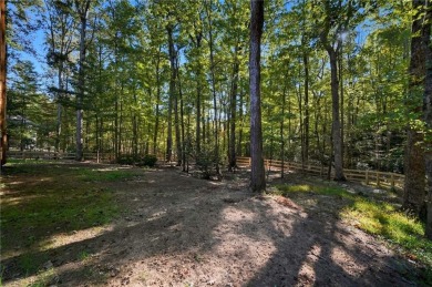 Welcome home to a beautifully updated retreat that truly checks on The Highlands Course at Lake Arrowhead in Georgia - for sale on GolfHomes.com, golf home, golf lot