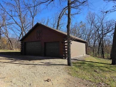 Discover the perfect blend of timeless appeal and modern on Lake Carroll Golf Course in Illinois - for sale on GolfHomes.com, golf home, golf lot