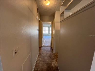 Welcome to this 1 bed 1 bath condo footsteps away from East on On Top Of The World Golf Course in Florida - for sale on GolfHomes.com, golf home, golf lot