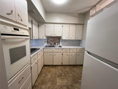 Welcome to this 1 bed 1 bath condo footsteps away from East on On Top Of The World Golf Course in Florida - for sale on GolfHomes.com, golf home, golf lot