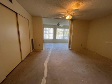 Welcome to this 1 bed 1 bath condo footsteps away from East on On Top Of The World Golf Course in Florida - for sale on GolfHomes.com, golf home, golf lot
