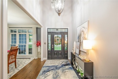Southern charmer nestled on #2 fairway in King's Grant Golf & on Kings Grant Golf and Country Club in North Carolina - for sale on GolfHomes.com, golf home, golf lot