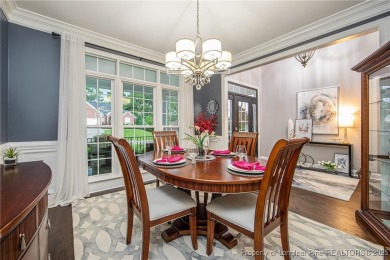 Southern charmer nestled on #2 fairway in King's Grant Golf & on Kings Grant Golf and Country Club in North Carolina - for sale on GolfHomes.com, golf home, golf lot