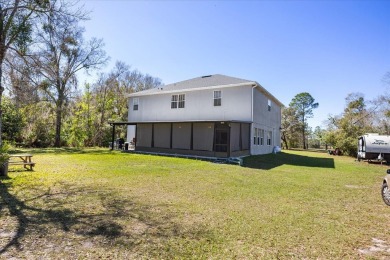 Discover the perfect blend of space, privacy, and thoughtful on Wedgefield Golf Club in Florida - for sale on GolfHomes.com, golf home, golf lot