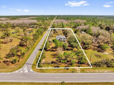 Discover the perfect blend of space, privacy, and thoughtful on Wedgefield Golf Club in Florida - for sale on GolfHomes.com, golf home, golf lot