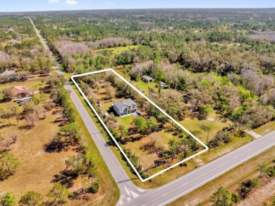 Discover the perfect blend of space, privacy, and thoughtful on Wedgefield Golf Club in Florida - for sale on GolfHomes.com, golf home, golf lot