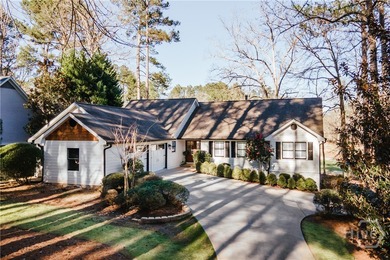 Welcome to 1040 Spy Glass Hill, a beautifully reimagined retreat on Harbor Club Golf and Country Club in Georgia - for sale on GolfHomes.com, golf home, golf lot