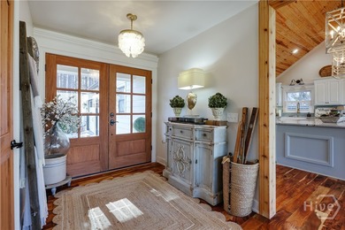 Welcome to 1040 Spy Glass Hill, a beautifully reimagined retreat on Harbor Club Golf and Country Club in Georgia - for sale on GolfHomes.com, golf home, golf lot