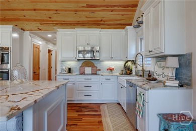 Welcome to 1040 Spy Glass Hill, a beautifully reimagined retreat on Harbor Club Golf and Country Club in Georgia - for sale on GolfHomes.com, golf home, golf lot