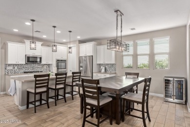Enjoy the best of 55+ living in this charming single-level home on Verrado Golf Club - Victory in Arizona - for sale on GolfHomes.com, golf home, golf lot