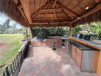 Enjoy sweeping panoramic views from this exceptional 3,031 sq ft on St. Lucie Trail Golf Club in Florida - for sale on GolfHomes.com, golf home, golf lot