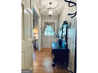 This 4 bedroom, 3 bath ranch has perfect bones and a great floor on Cherokee Golf and Country Club in Georgia - for sale on GolfHomes.com, golf home, golf lot