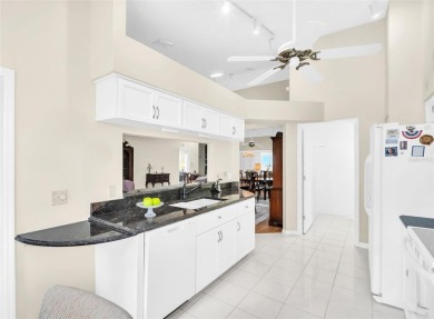 Beautifully updated 2-bedroom, 2-bathroom home with a large on Highland Lakes Executive Golf Course in Florida - for sale on GolfHomes.com, golf home, golf lot