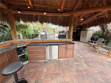 Enjoy sweeping panoramic views from this exceptional 3,031 sq ft on St. Lucie Trail Golf Club in Florida - for sale on GolfHomes.com, golf home, golf lot