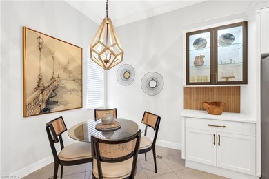 Experience resort-style living in this impeccably updated on The Rookery At Marco in Florida - for sale on GolfHomes.com, golf home, golf lot