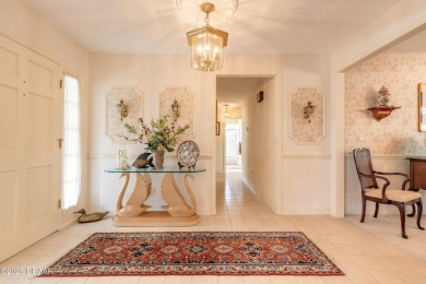 Nestled within the sought-after gated golf community of Pelican on The Club At Pelican Bay - North Course in Florida - for sale on GolfHomes.com, golf home, golf lot