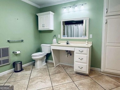 This 4 bedroom, 3 bath ranch has perfect bones and a great floor on Cherokee Golf and Country Club in Georgia - for sale on GolfHomes.com, golf home, golf lot