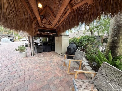 Enjoy sweeping panoramic views from this exceptional 3,031 sq ft on St. Lucie Trail Golf Club in Florida - for sale on GolfHomes.com, golf home, golf lot