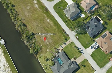 Exceptional Waterfront Vacant Lot in Coral Oaks Golf Community on Burnt Store Golf Club in Florida - for sale on GolfHomes.com, golf home, golf lot