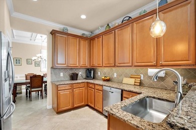 Welcome to this well-maintained Oleander Coach Home in the gated on Plantation Golf and Country Club in Florida - for sale on GolfHomes.com, golf home, golf lot