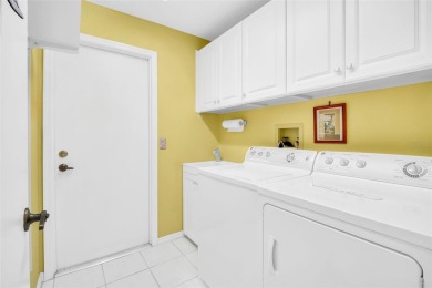 Beautifully updated 2-bedroom, 2-bathroom home with a large on Highland Lakes Executive Golf Course in Florida - for sale on GolfHomes.com, golf home, golf lot
