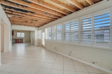 GREAT BONES NEEDS TLC & A NEW ROOF CASH ONLY! MAY HAVE MOLD on Leisureville Community Golf Course in Florida - for sale on GolfHomes.com, golf home, golf lot