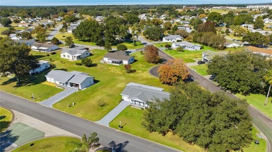 Welcome Home to this lovely MAPLE MODEL. This is a 2-bedroom on The Links of Spruce Creek in Florida - for sale on GolfHomes.com, golf home, golf lot