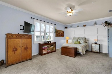 Welcome to this well-maintained Oleander Coach Home in the gated on Plantation Golf and Country Club in Florida - for sale on GolfHomes.com, golf home, golf lot