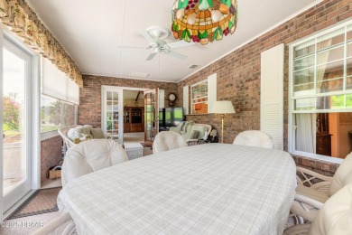 Nestled within the sought-after gated golf community of Pelican on The Club At Pelican Bay - North Course in Florida - for sale on GolfHomes.com, golf home, golf lot