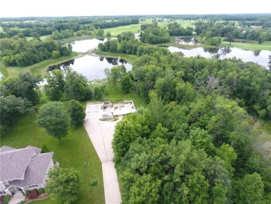 Nestled on a prime .82-acre parcel just steps from the serene on Geneva Golf Club in Minnesota - for sale on GolfHomes.com, golf home, golf lot