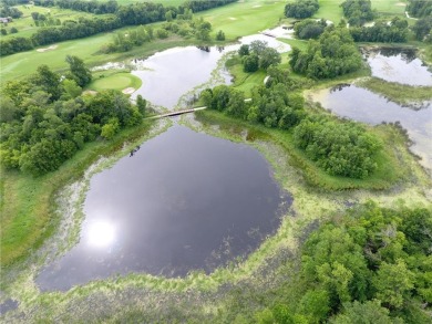 Nestled on a prime .82-acre parcel just steps from the serene on Geneva Golf Club in Minnesota - for sale on GolfHomes.com, golf home, golf lot