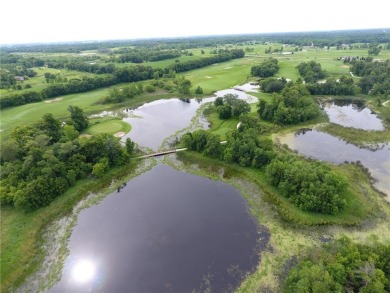 Nestled on a prime .82-acre parcel just steps from the serene on Geneva Golf Club in Minnesota - for sale on GolfHomes.com, golf home, golf lot