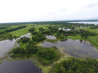 Nestled on a prime .82-acre parcel just steps from the serene on Geneva Golf Club in Minnesota - for sale on GolfHomes.com, golf home, golf lot