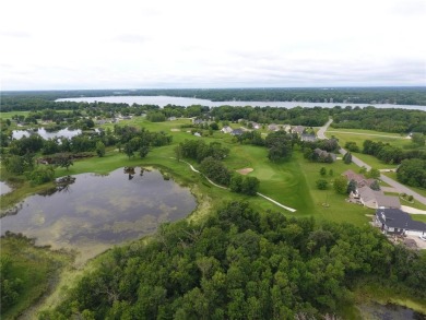 Nestled on a prime .82-acre parcel just steps from the serene on Geneva Golf Club in Minnesota - for sale on GolfHomes.com, golf home, golf lot