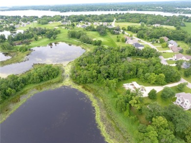 Nestled on a prime .82-acre parcel just steps from the serene on Geneva Golf Club in Minnesota - for sale on GolfHomes.com, golf home, golf lot