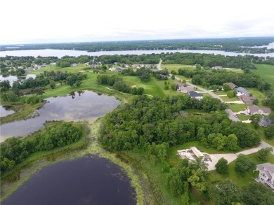 Nestled on a prime .82-acre parcel just steps from the serene on Geneva Golf Club in Minnesota - for sale on GolfHomes.com, golf home, golf lot