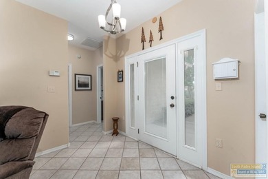 Well-maintained waterfront villa offering furnished, turn-key on South Padre Island Golf Club in Texas - for sale on GolfHomes.com, golf home, golf lot