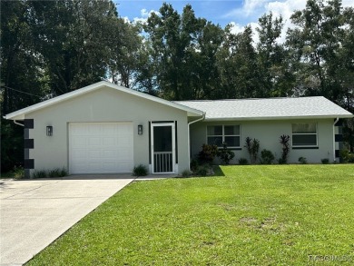 Charming Renovated Home in Citrus Springs - Move-In Ready! This on Citrus Springs Country Club in Florida - for sale on GolfHomes.com, golf home, golf lot