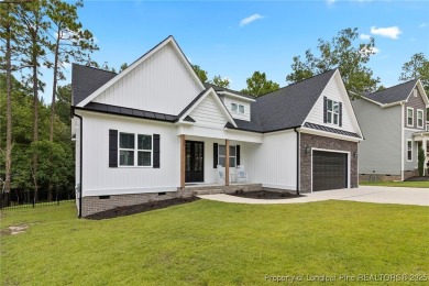 You do not want to miss out on this gorgeous custom-built home on Carolina Lakes Country Club in North Carolina - for sale on GolfHomes.com, golf home, golf lot