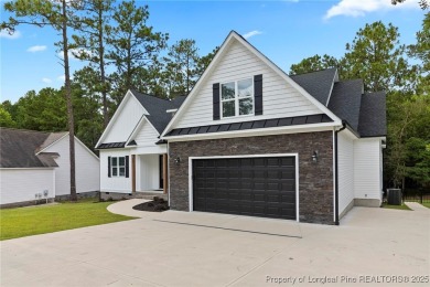 You do not want to miss out on this gorgeous custom-built home on Carolina Lakes Country Club in North Carolina - for sale on GolfHomes.com, golf home, golf lot
