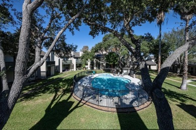 Pool views and relaxing feeling this condo in the prestigious on Rockport Country Club in Texas - for sale on GolfHomes.com, golf home, golf lot